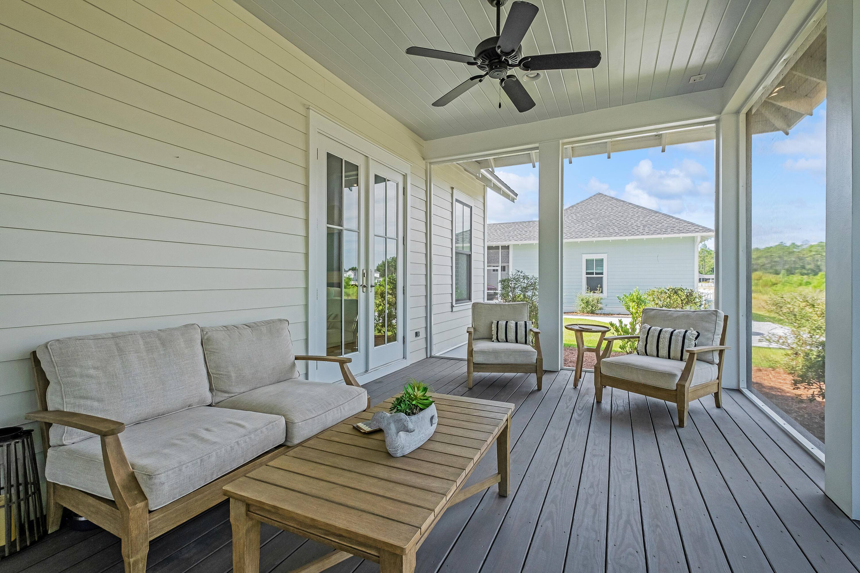 161 Sidecamp Rd Inlet Beach Inlet Beach, FL 32461 - Photo 46 of 66 a outdoor living space with furniture and wooden floor