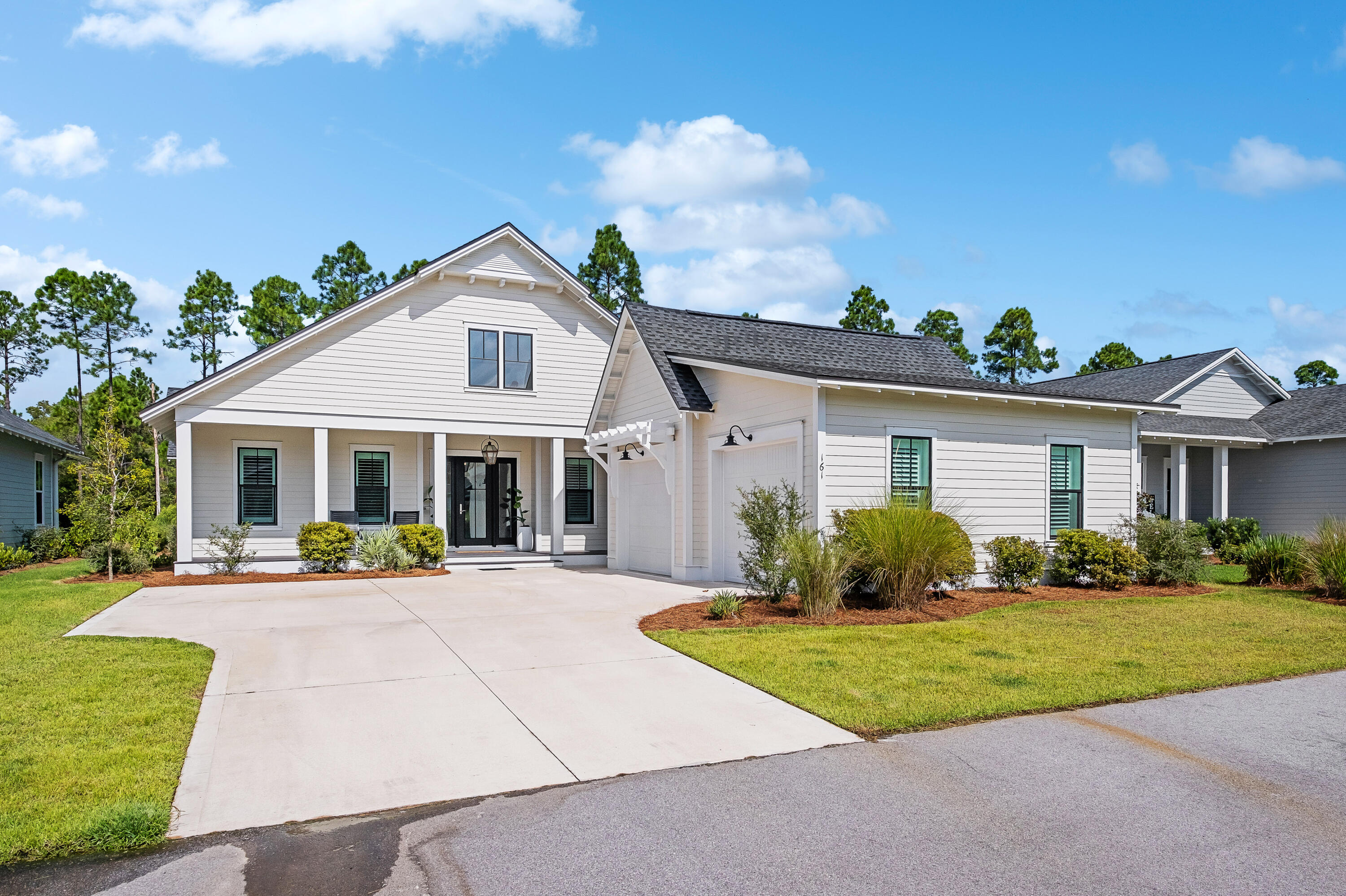 161 Sidecamp Rd Inlet Beach Inlet Beach, FL 32461 - Photo 50 of 66 a front view of a house with a yard
