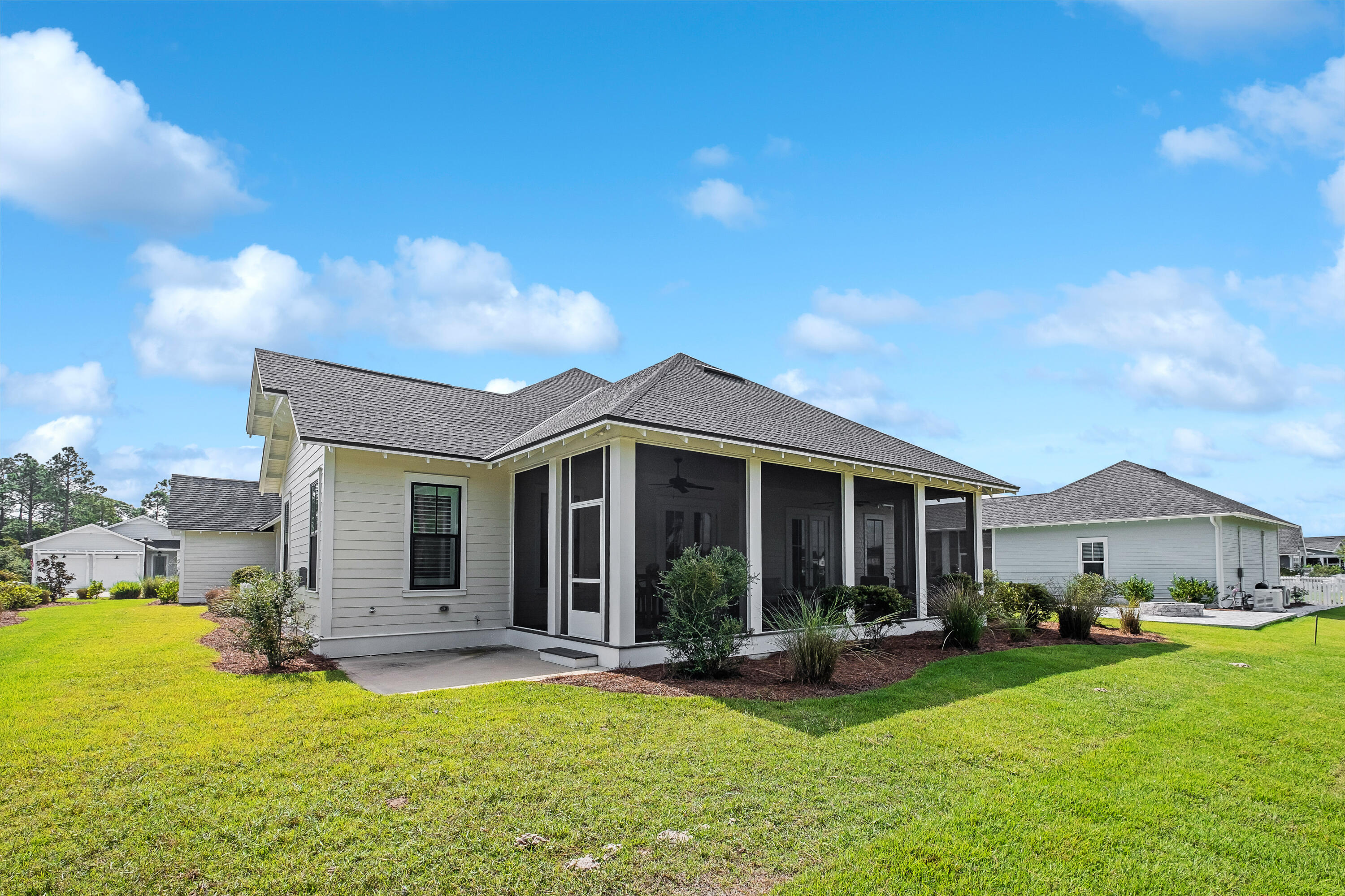 161 Sidecamp Rd Inlet Beach Inlet Beach, FL 32461 - Photo 54 of 66 a view of a house with a yard and a porch