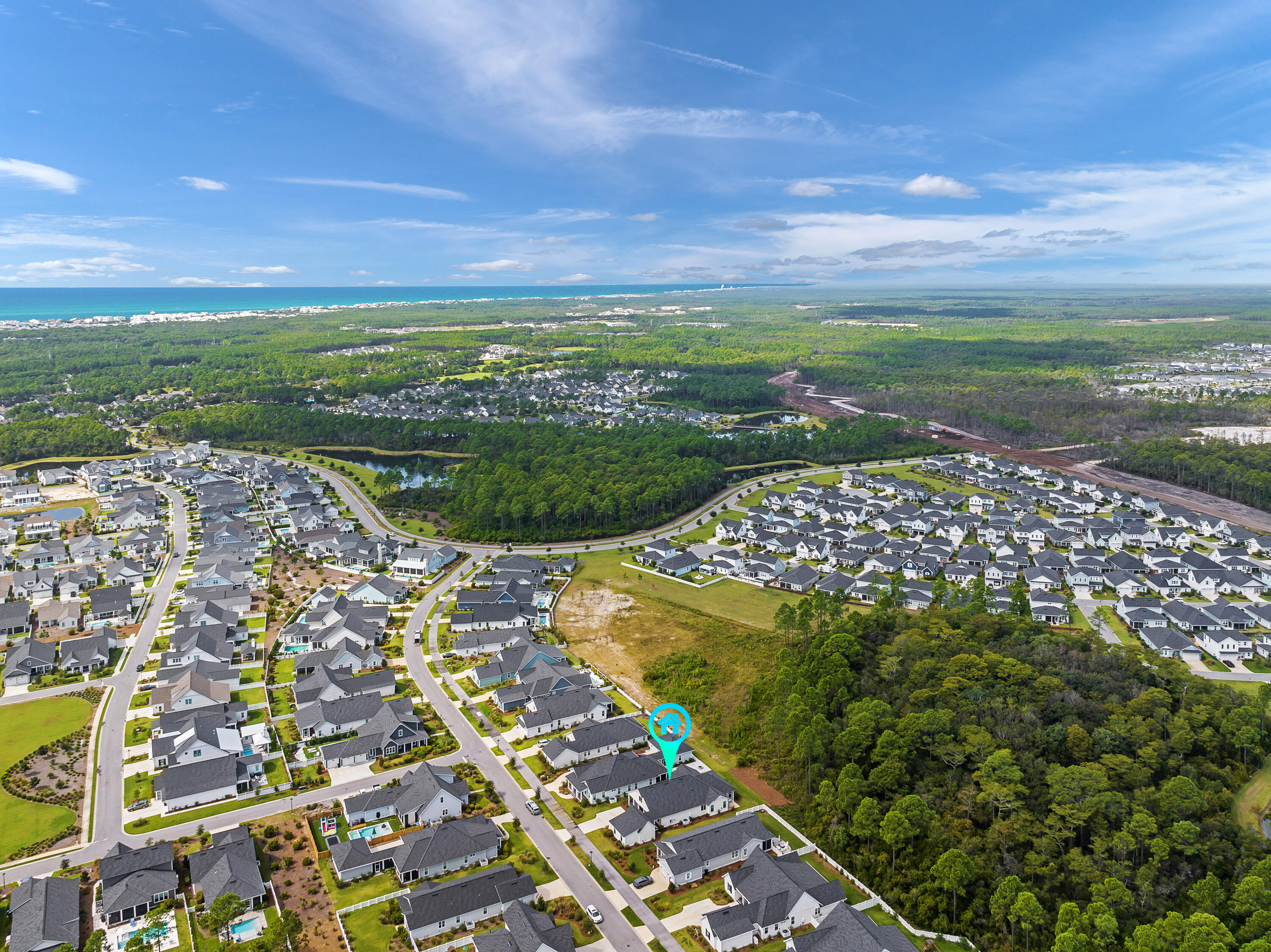 161 Sidecamp Rd Inlet Beach Inlet Beach, FL 32461 - Photo 65 of 66 a view of a lake with a building in the background