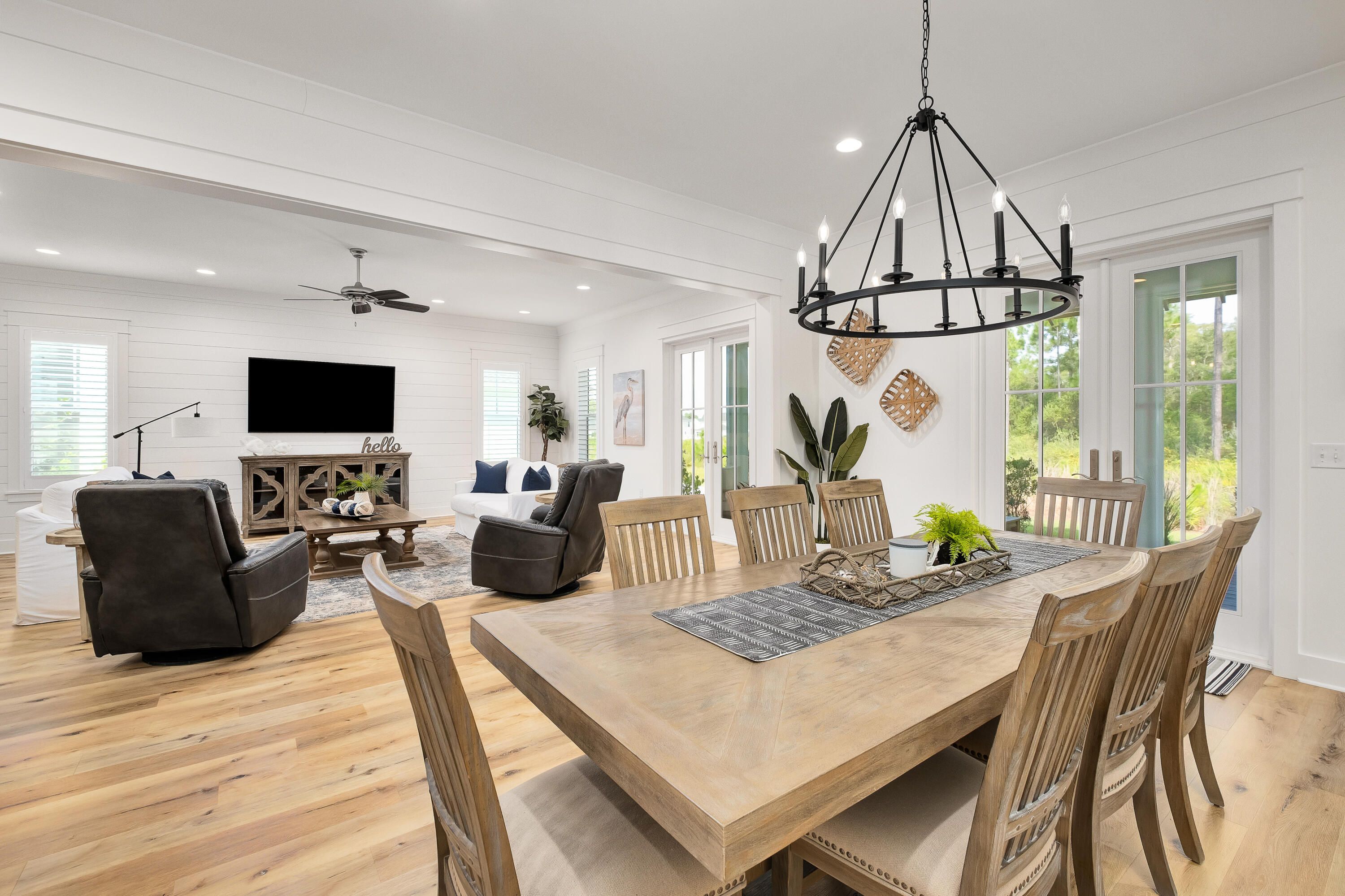 161 Sidecamp Rd Inlet Beach Inlet Beach, FL 32461 - Photo 8 of 66 a living room with furniture a flat screen tv and a floor to ceiling window
