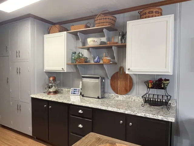 a kitchen with sink and window
