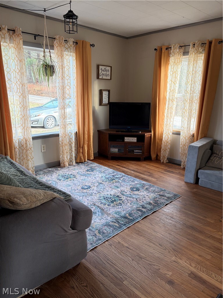 3719 Holmes Road Cambridge, OH 43725 - Photo 7 of 20 Living room with wood finished floors
