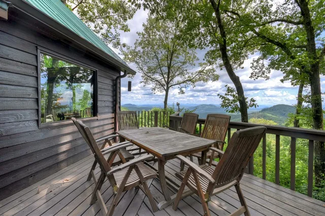 a view of a trees with a yard