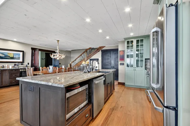 a view of an entryway with a floor to ceiling window