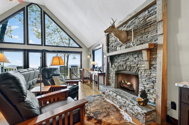 a view of a table and chairs under an umbrella