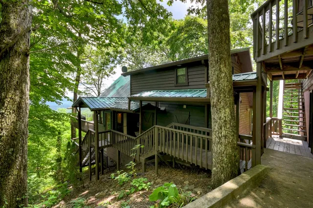 a view of a chair and table on the wooden floor