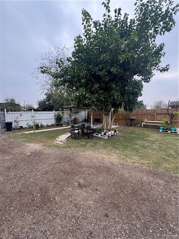 206 Commercial Street Edcouch, TX 78538 - Photo 16 of 16 a view of a house with backyard