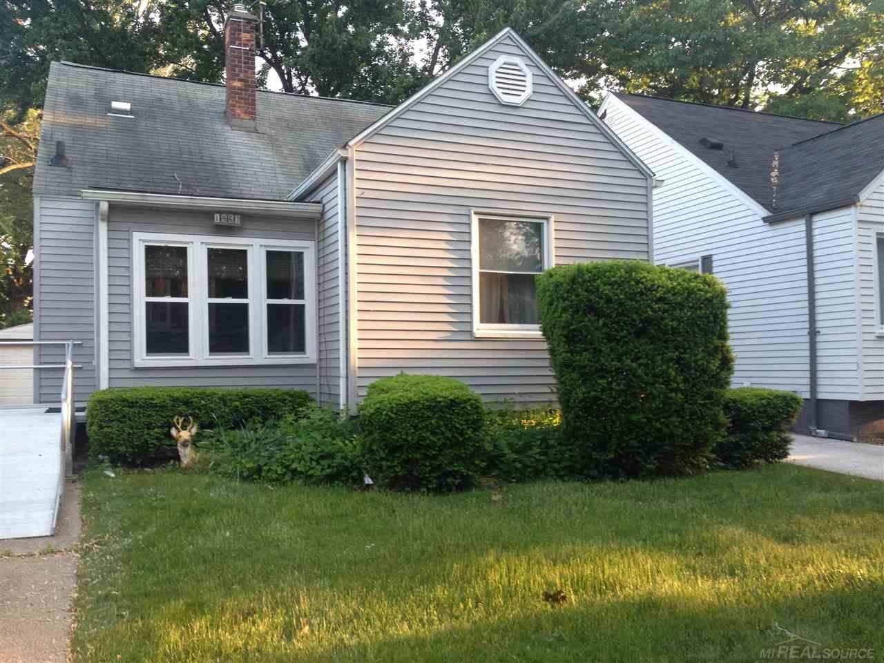 1967 Roslyn Road Grosse Pointe Woods, MI 48236 - Photo 1 of 8