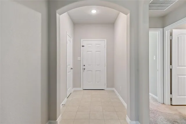 a view of a hallway with an empty space