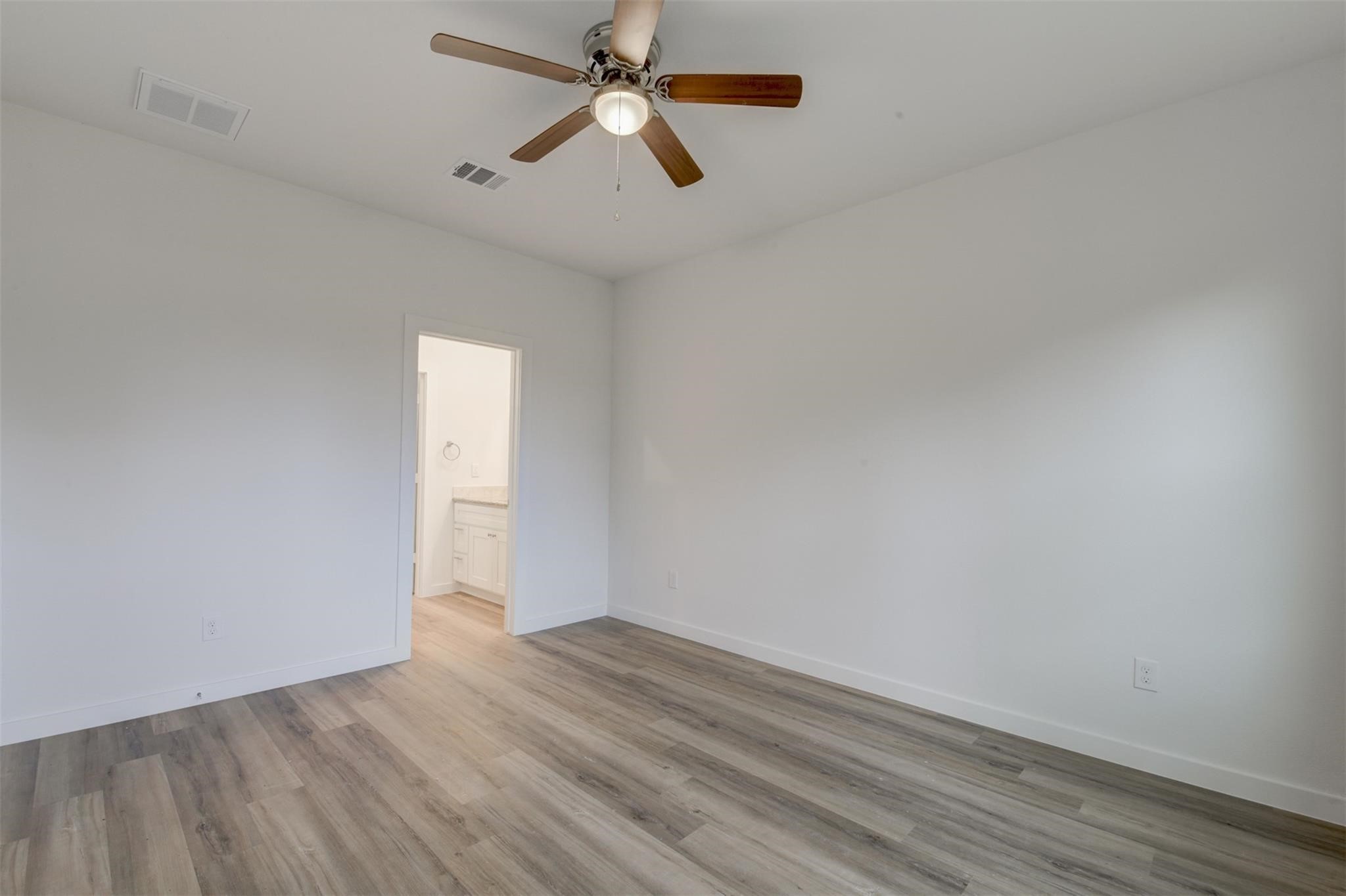8410 Sandra Street Houston, TX 77016 - Photo 11 of 23 wooden floor in an empty room
