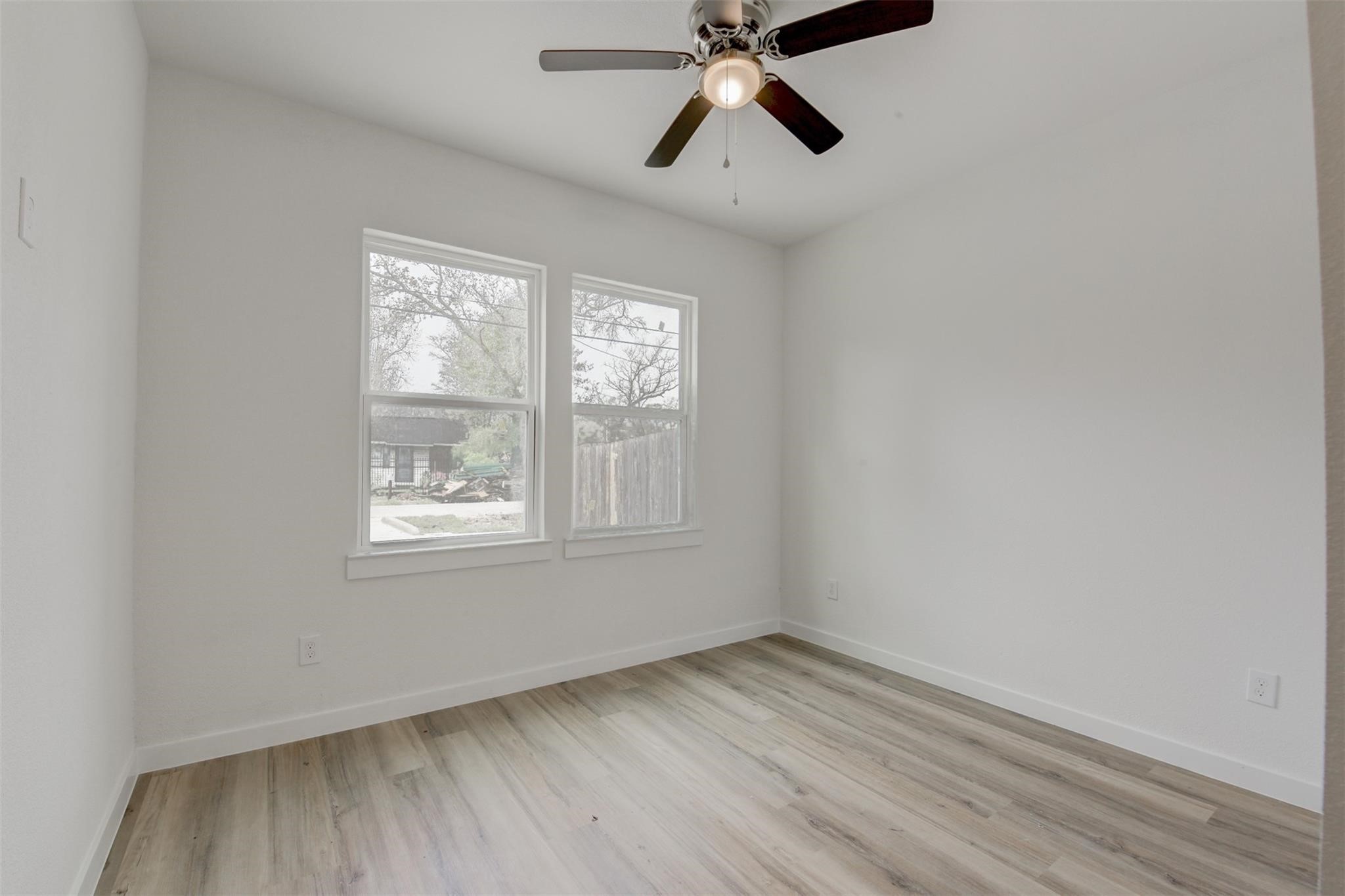 8410 Sandra Street Houston, TX 77016 - Photo 21 of 23 an empty room with a window