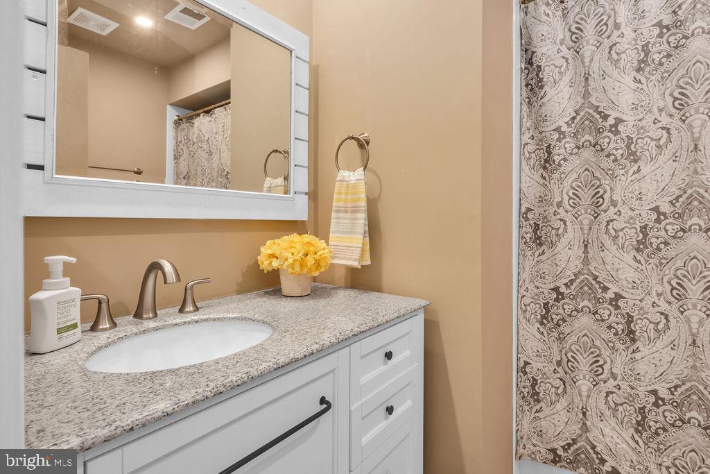 110 Environs Road Sterling, VA 20165 - Photo 12 of 17 Renovated Upstairs Hall Bath