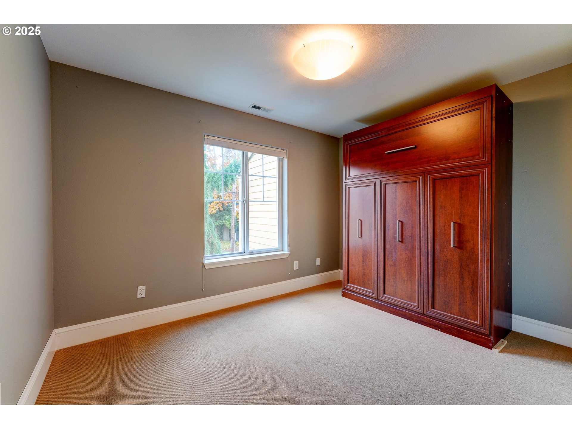502 Northeast Knott Street Portland, OR 97212 - Photo 24 of 44 a view of an empty room and window