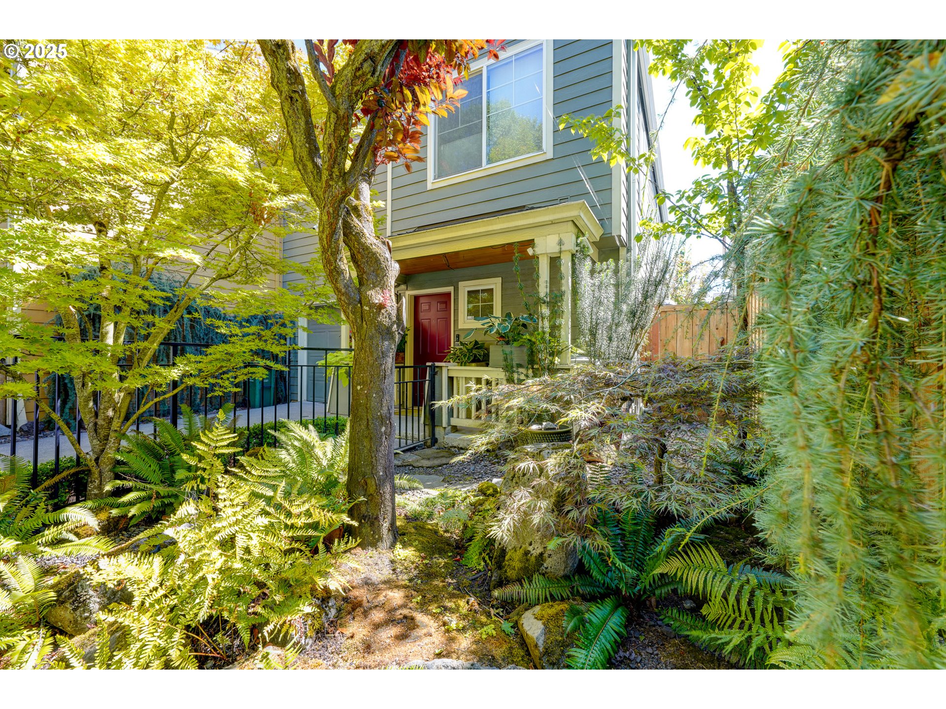 502 Northeast Knott Street Portland, OR 97212 - Photo 3 of 44 a view of a house with a tree