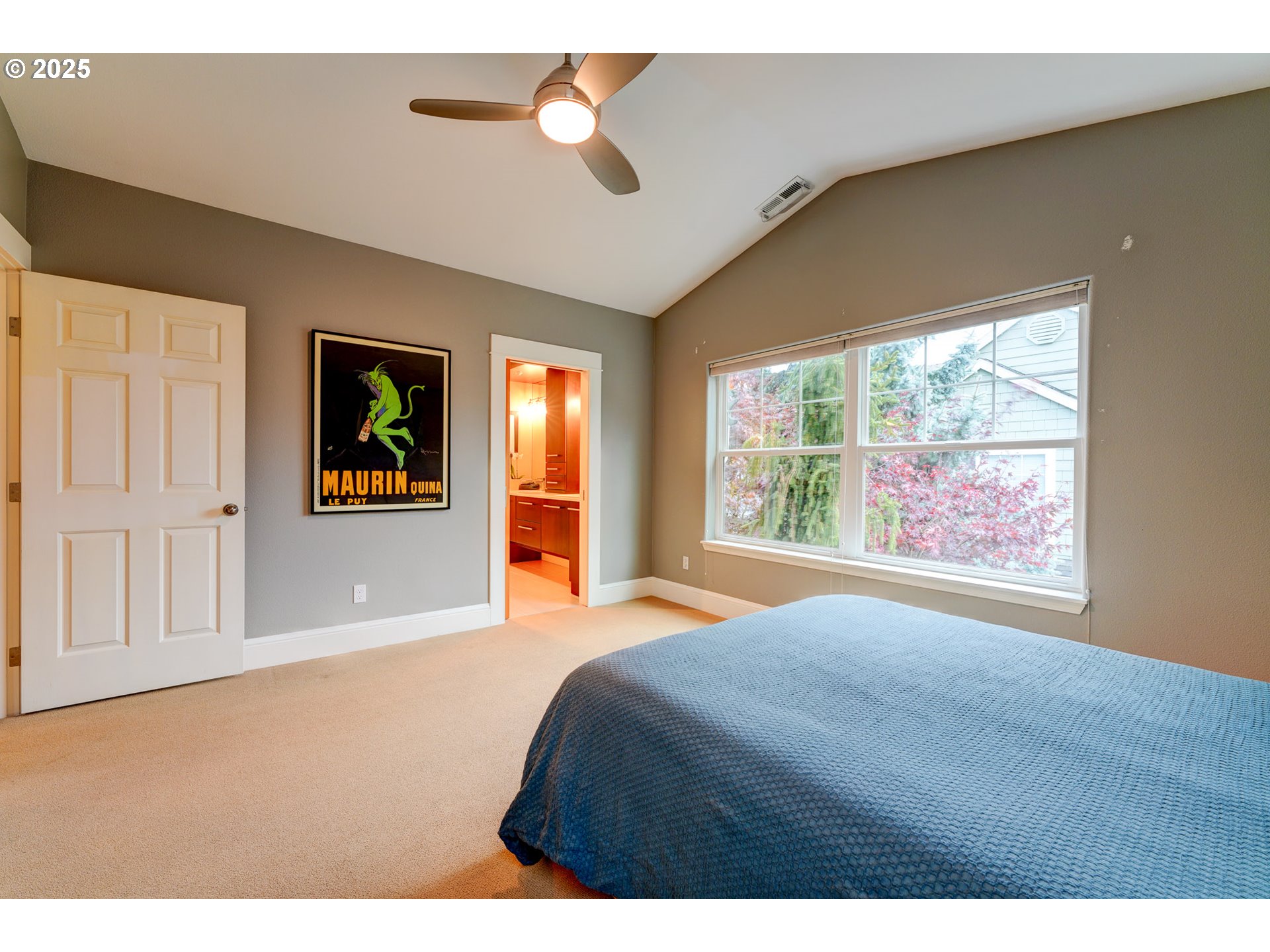 502 Northeast Knott Street Portland, OR 97212 - Photo 32 of 44 a bedroom with a bed and a large window