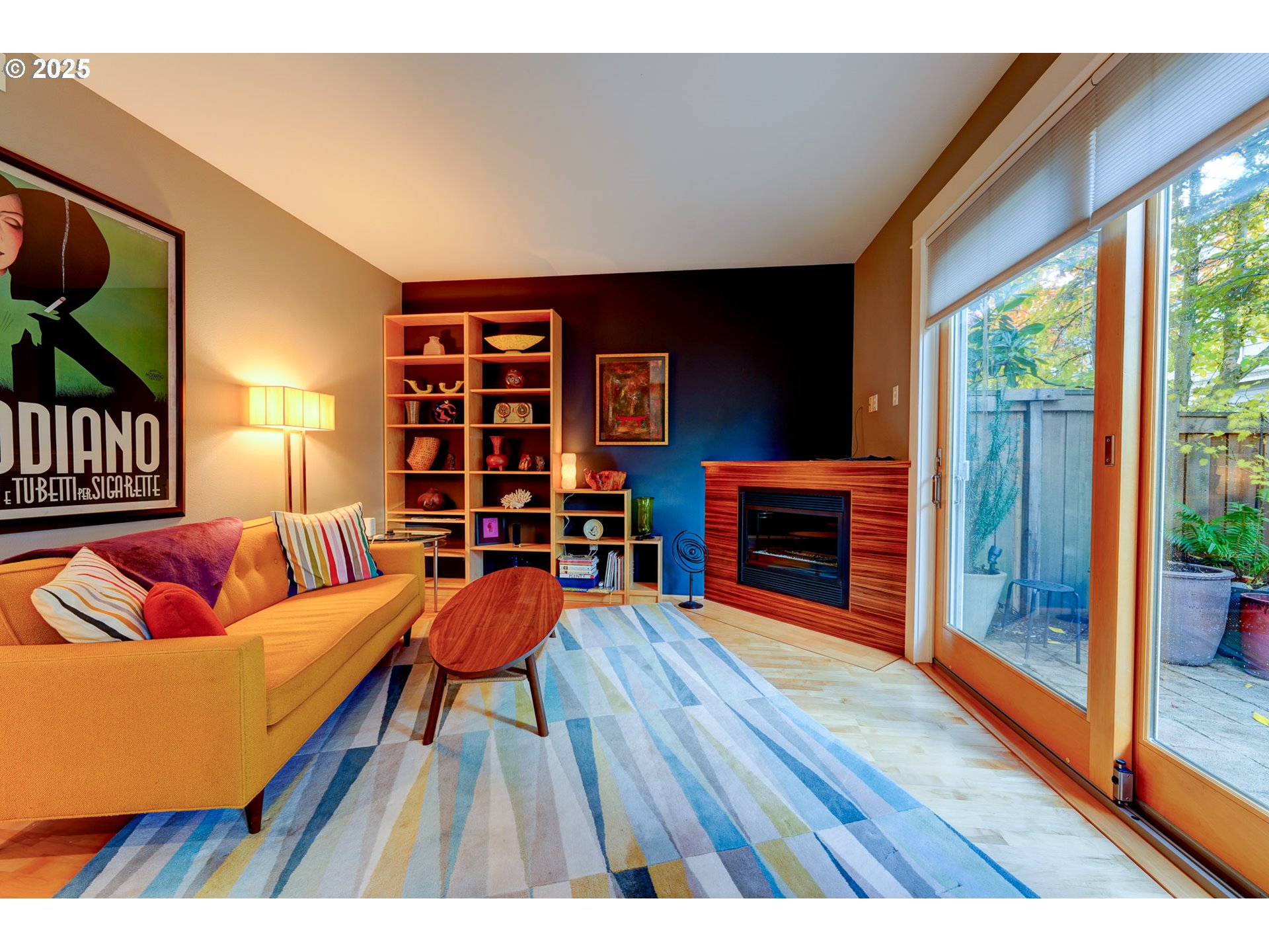 502 Northeast Knott Street Portland, OR 97212 - Photo 8 of 44 a living room with furniture and a fireplace
