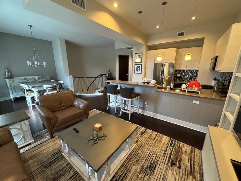 239 Cosmopolitan Court Sarasota, FL 34236 - Photo 14 of 29 a living room with furniture and a table
