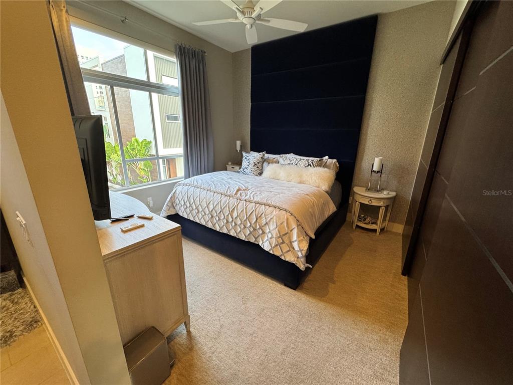 239 Cosmopolitan Court Sarasota, FL 34236 - Photo 16 of 29 a bedroom with a bed and a window