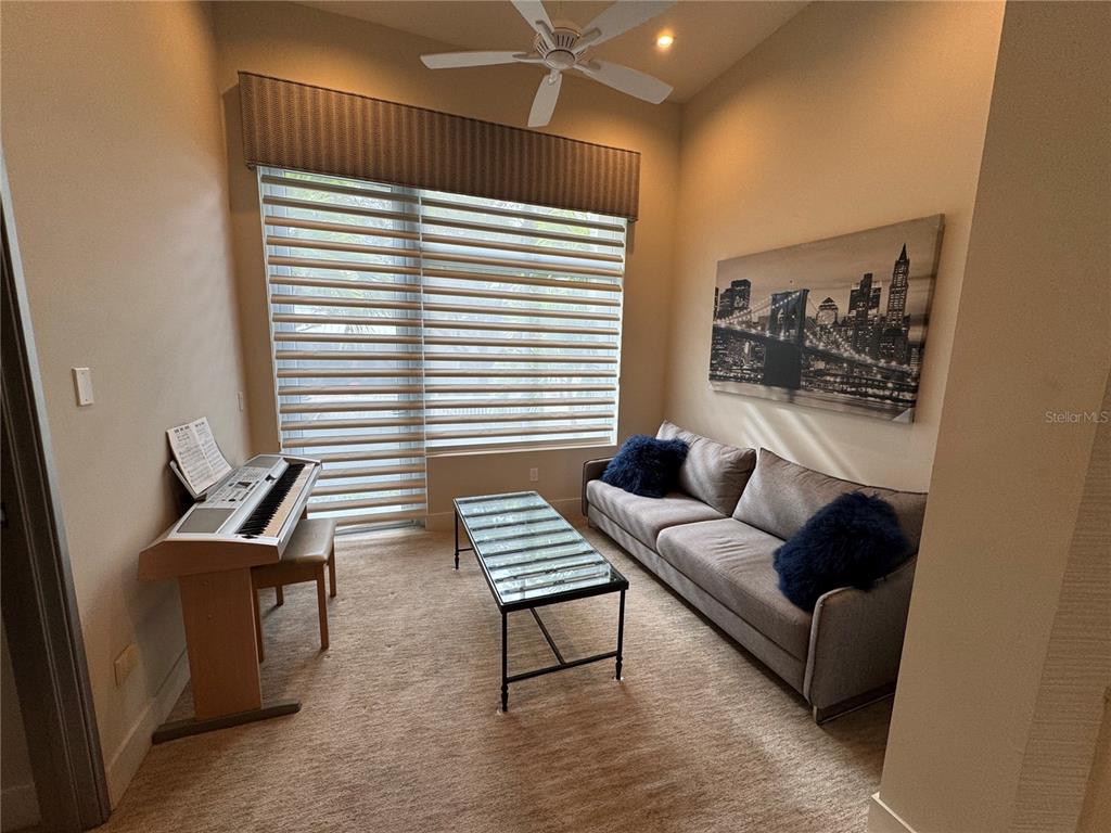 239 Cosmopolitan Court Sarasota, FL 34236 - Photo 24 of 29 a living room with furniture and a window