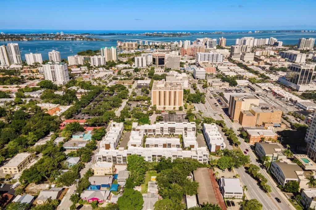 239 Cosmopolitan Court Sarasota, FL 34236 - Photo 28 of 29 a view of building with outdoor space