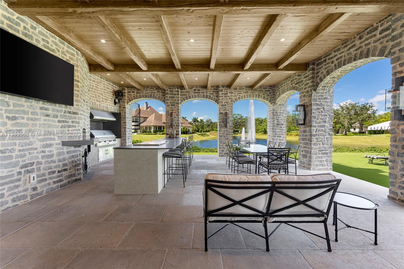 13000 Lewin Lane Southwest Ranches, FL 33330 - Photo 11 of 47 a view of a chairs and table in a patio