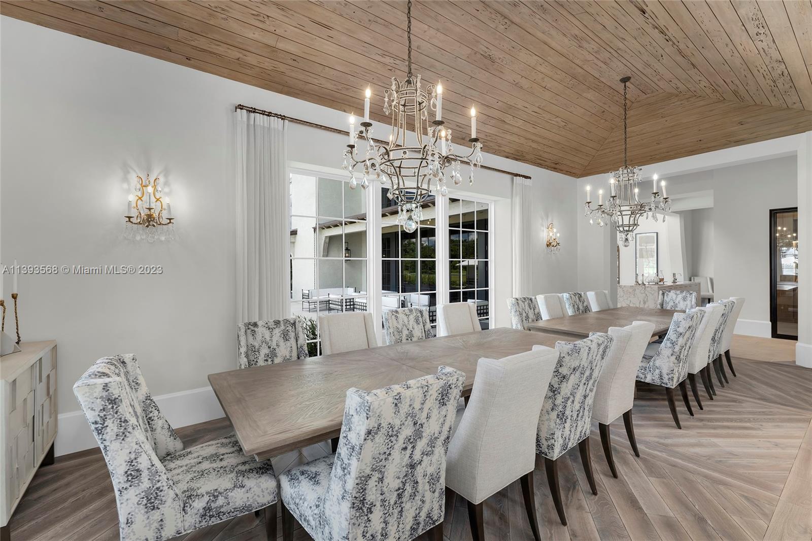 13000 Lewin Lane Southwest Ranches, FL 33330 - Photo 14 of 47 a view of a dining room with furniture wooden floor and chandelier