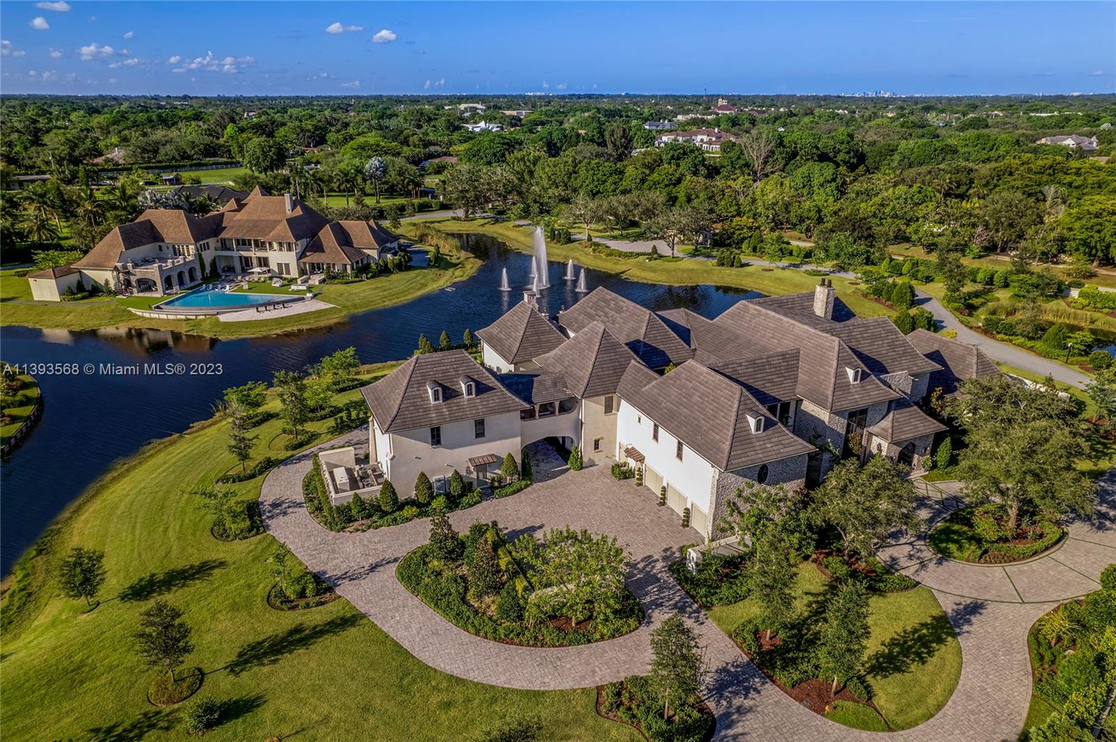 13000 Lewin Lane Southwest Ranches, FL 33330 - Photo 16 of 47 an aerial view of a house with a garden and lake view