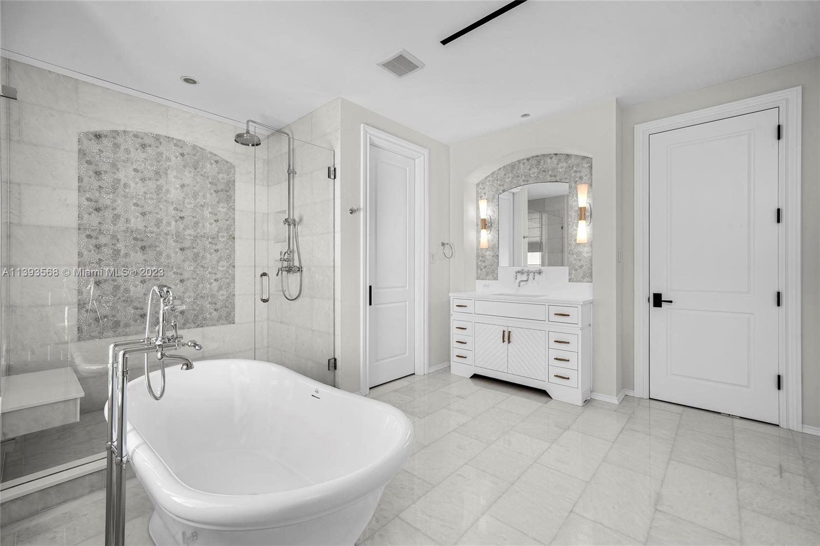 13000 Lewin Lane Southwest Ranches, FL 33330 - Photo 33 of 47 a bathroom with a sink a toilet a mirror and shower