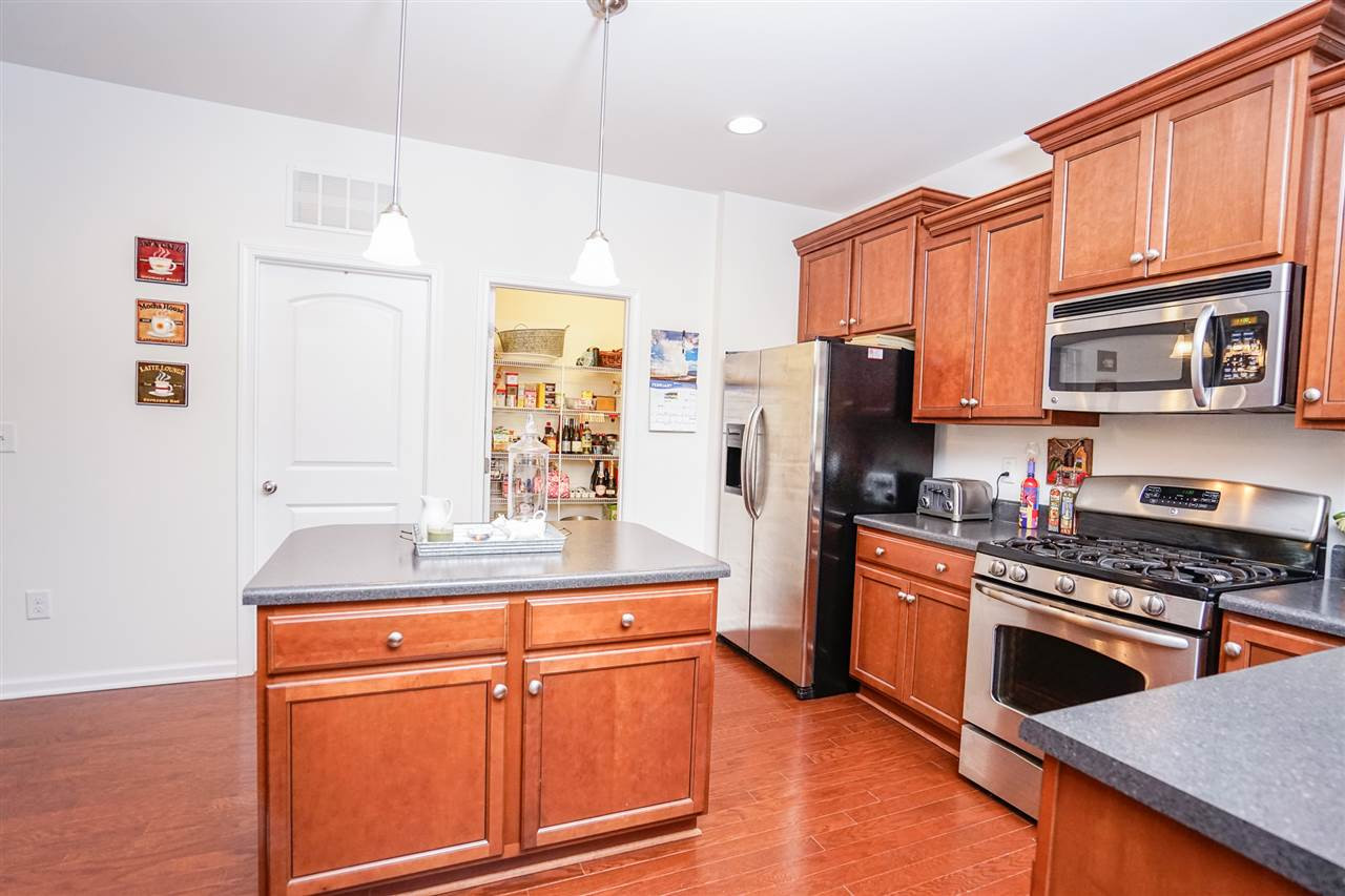 1604 Pattersons Mill Road Durham, NC 27703 - Photo 2 of 30 Gas stove. birch wood cabinets, lots of counter space & added prep space with island plus a large pantry. Kitchen