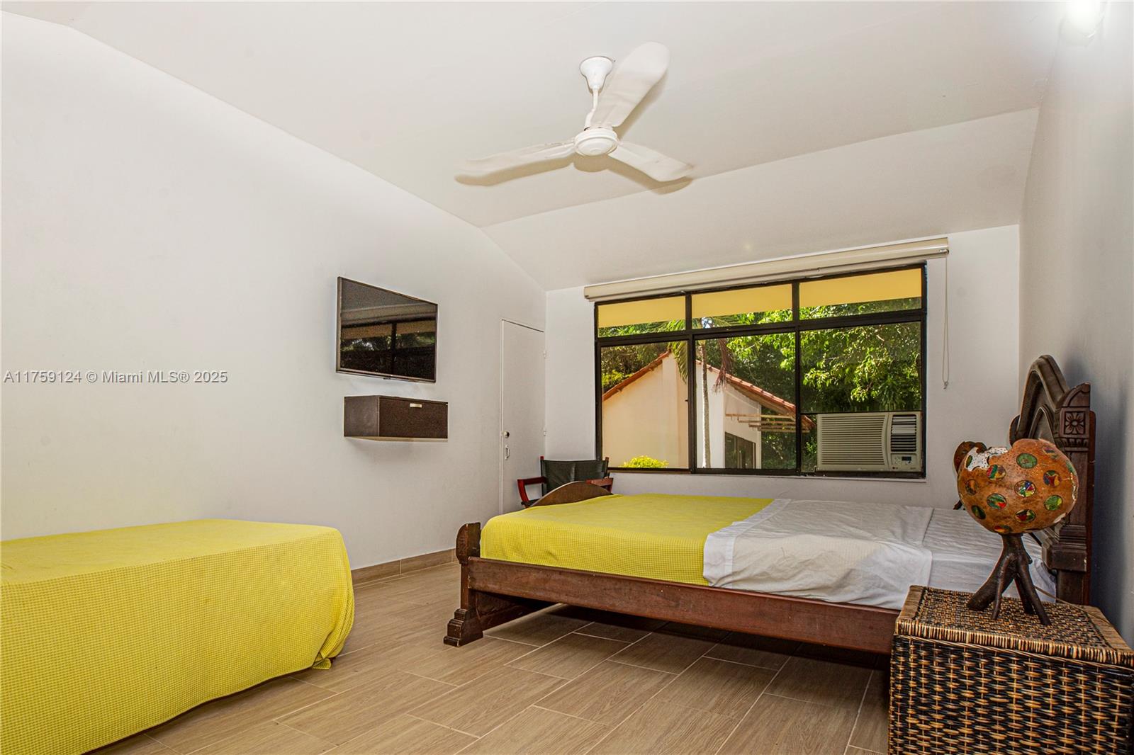 9 Via Girardot Tocaima undefined, CU 00000 - Photo 13 of 23 a bedroom with a bed and a couch