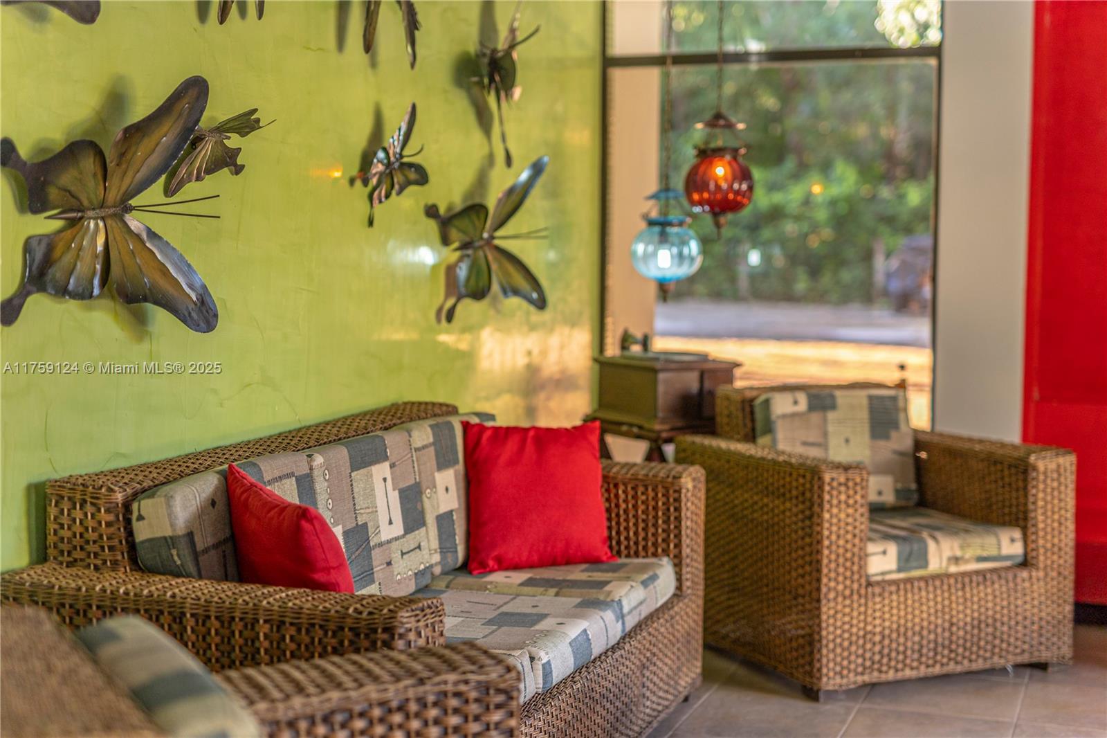 9 Via Girardot Tocaima undefined, CU 00000 - Photo 4 of 23 a living room with couch cabinet and a floor to ceiling window