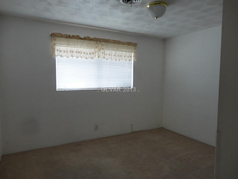 5049 Smoke Ranch Road Las Vegas, NV 89108 - Photo 17 of 27 Bedroom.