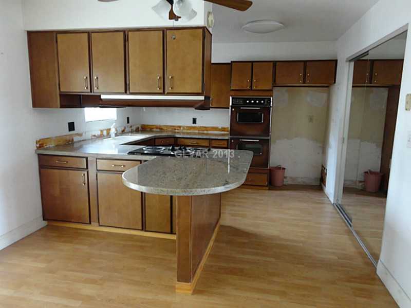 5049 Smoke Ranch Road Las Vegas, NV 89108 - Photo 7 of 27 Kitchen.