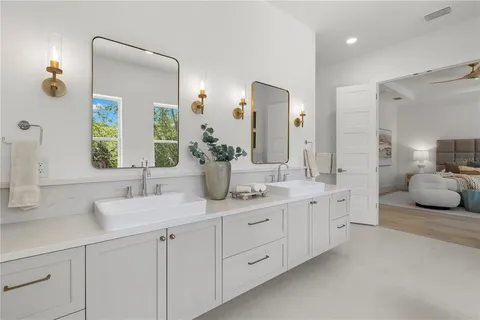 a bathroom with a shower and a sink