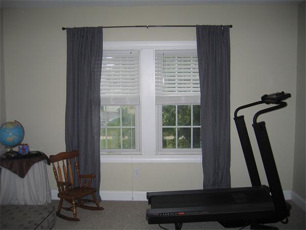 32 Rimmon Avenue Chicopee, MA 01013 - Photo 14 of 16 a living room with a chair and a large window