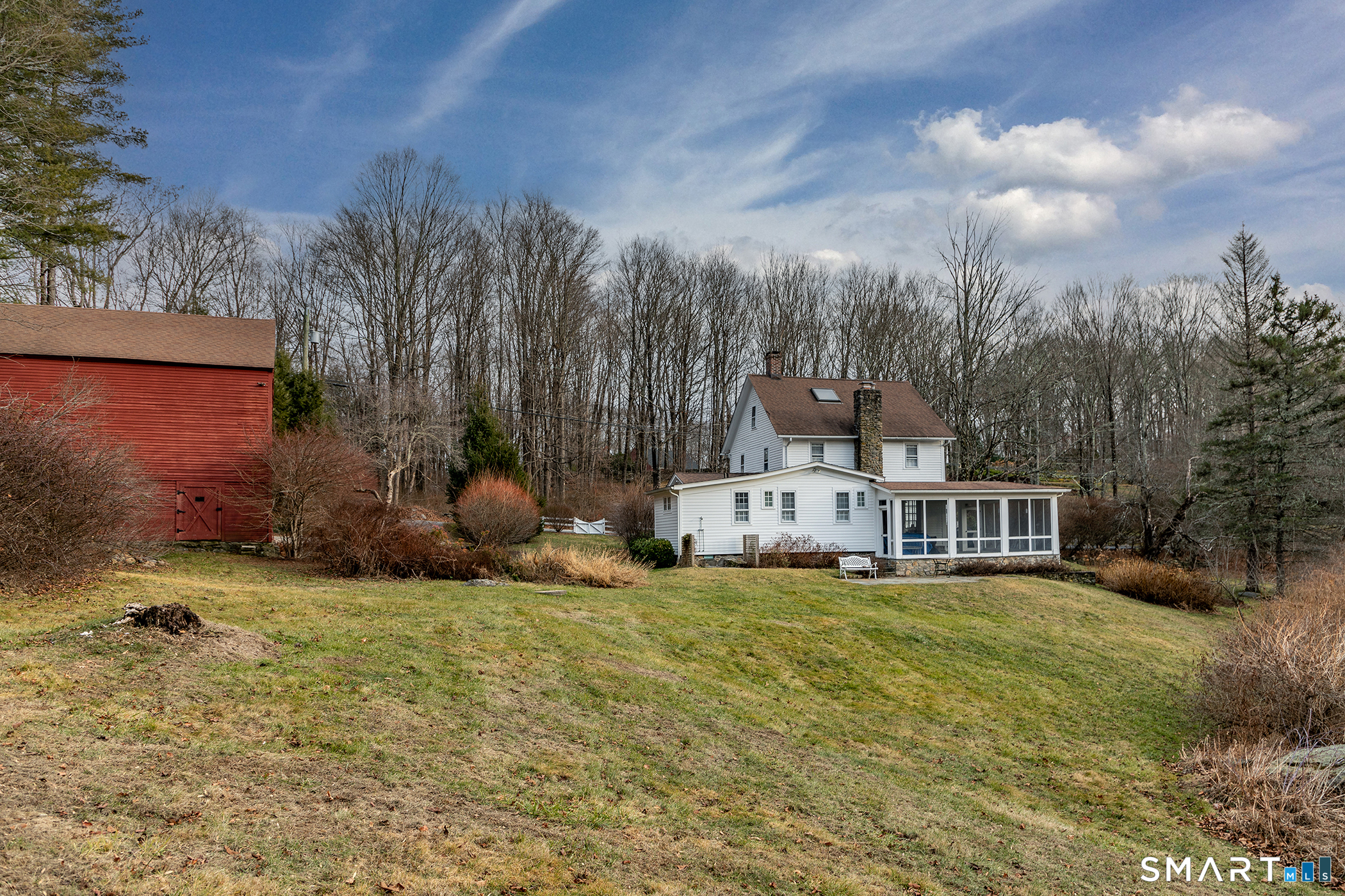 197 Skyline Ridge Road Bridgewater, CT 06752 - Photo 4 of 31 a view of a house with a yard and sitting area