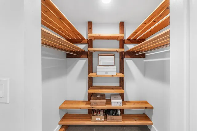 a view of staircase with wooden floor