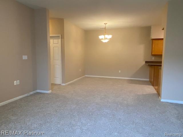 1105 Rial Lake Drive, Unit 45 Howell, MI 48843 - Photo 10 of 19 Looking from living room toward dining area.