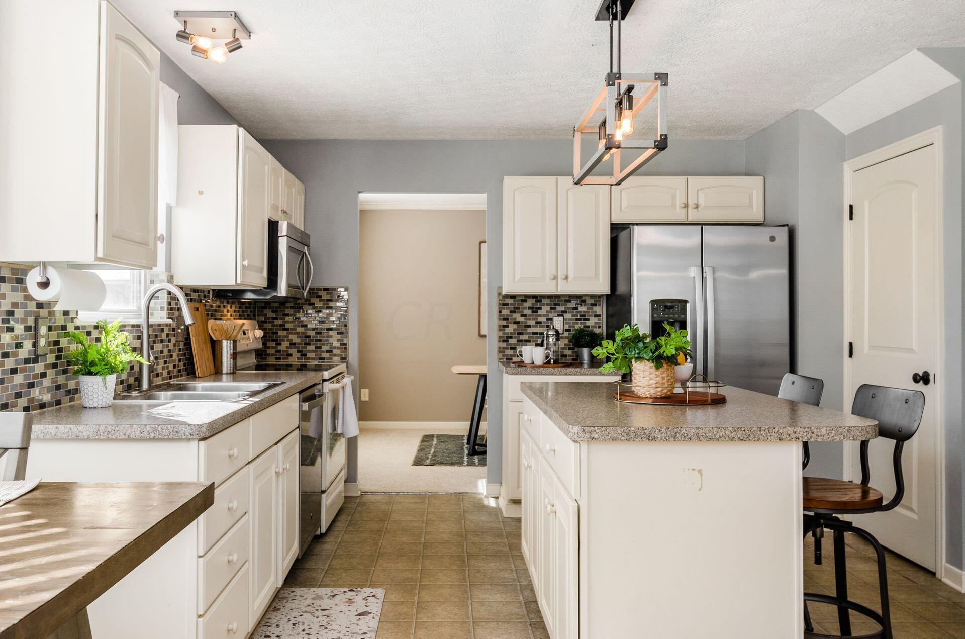 8243 Rodebaugh Road Reynoldsburg, OH 43068 - Photo 12 of 55 Updated lighting!