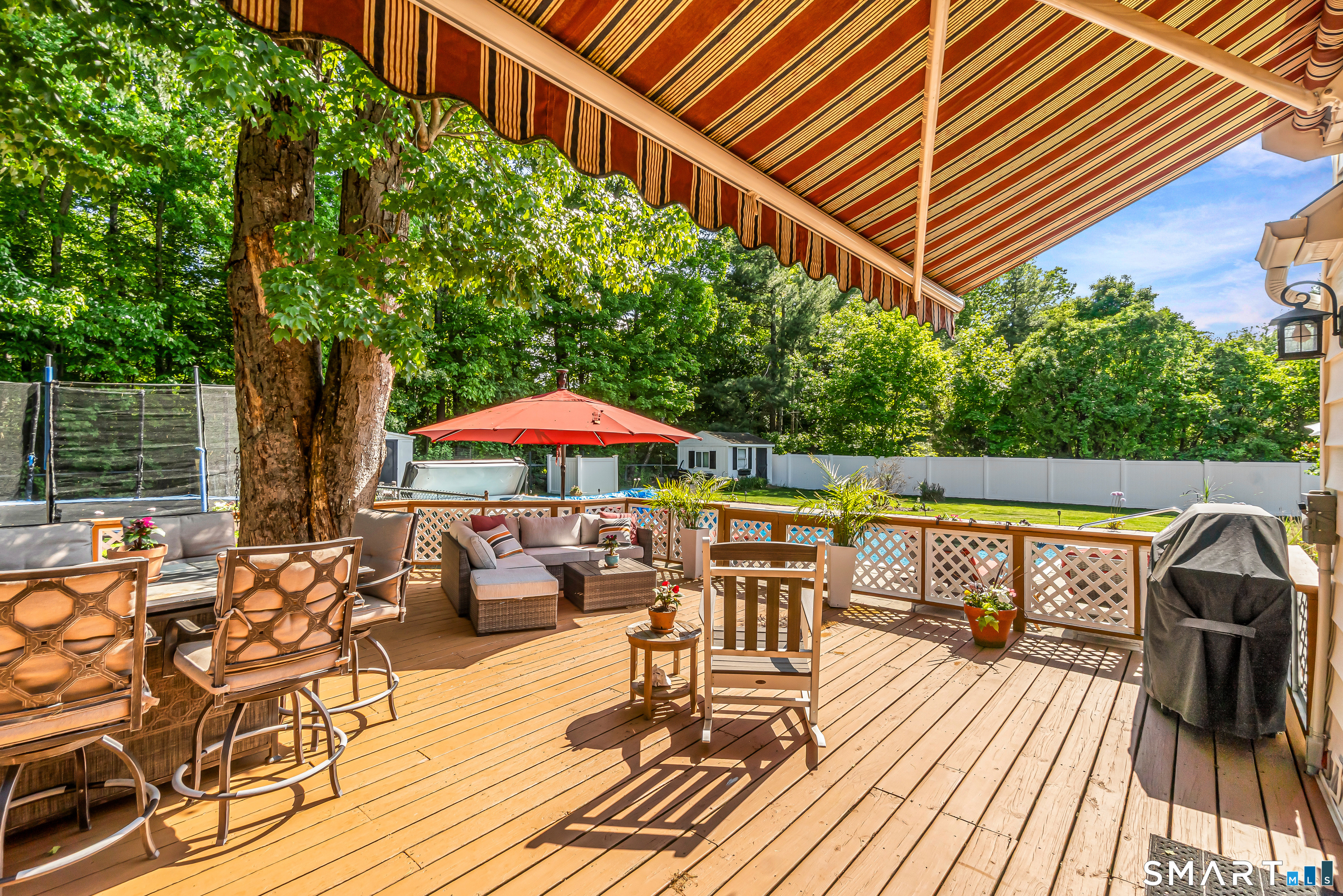 13 Pleasant Rise Circle Brookfield, CT 06804 - Photo 21 of 40 a view of deck with barbeque grill and wooden floor