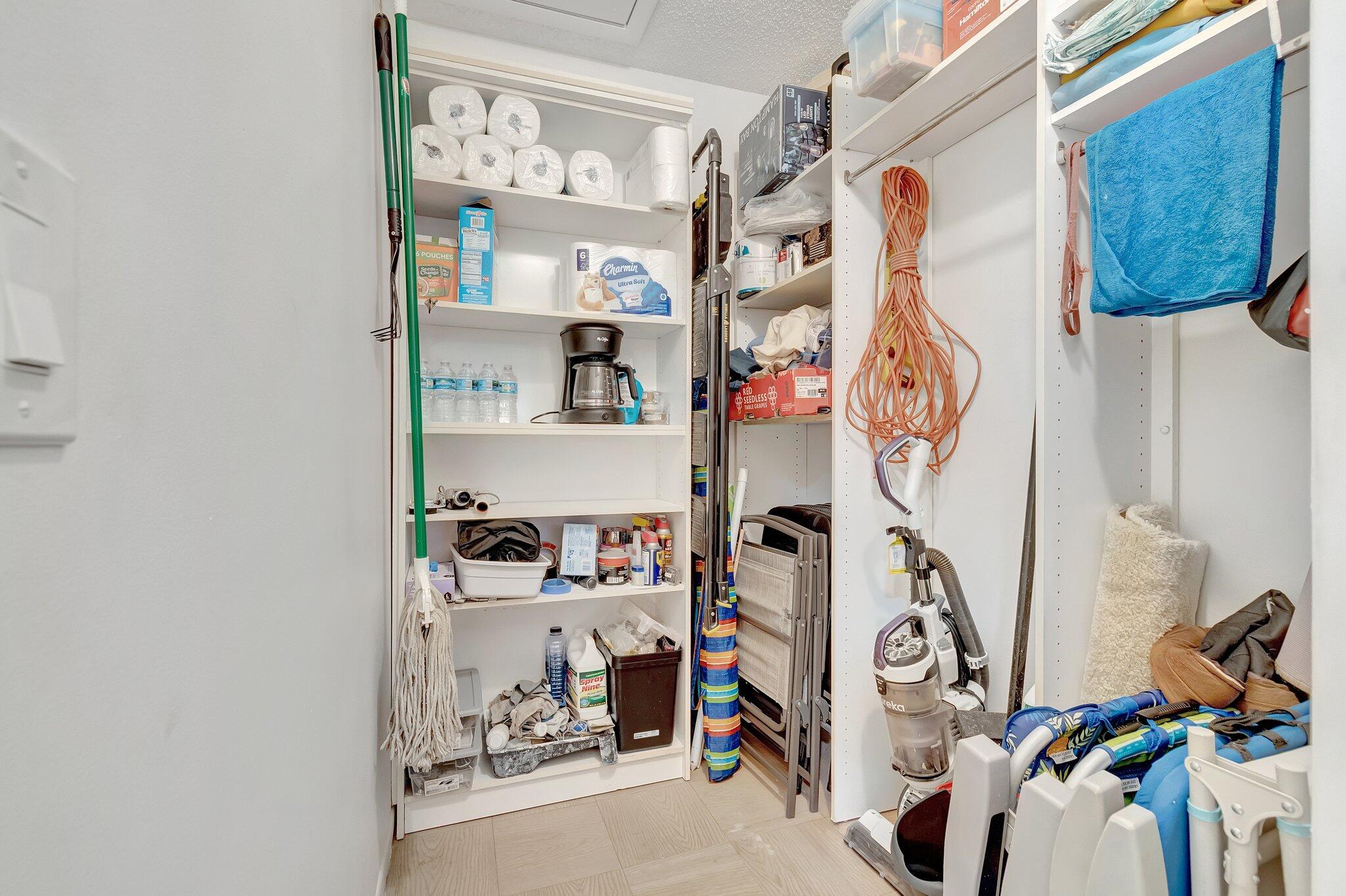 1375 High Point Way Southwest, Unit D Delray Beach, FL 33445 - Photo 31 of 54 Master bedroom walk in closet