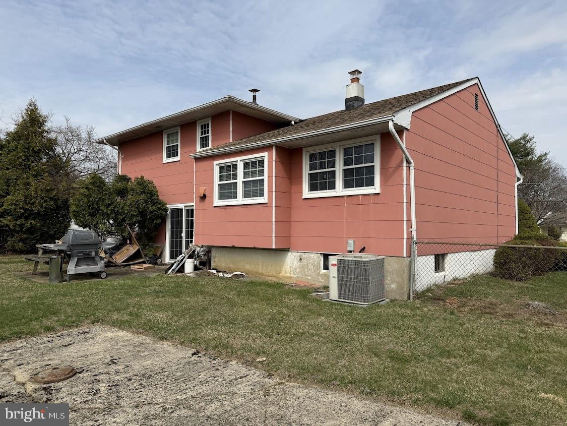 5 Clive Court Ewing, NJ 08638 - Photo 2 of 8 a front view of a house with a yard