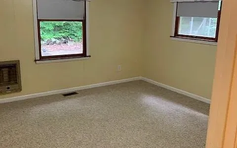 an empty room with a window
