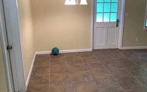 a view of empty room with windows