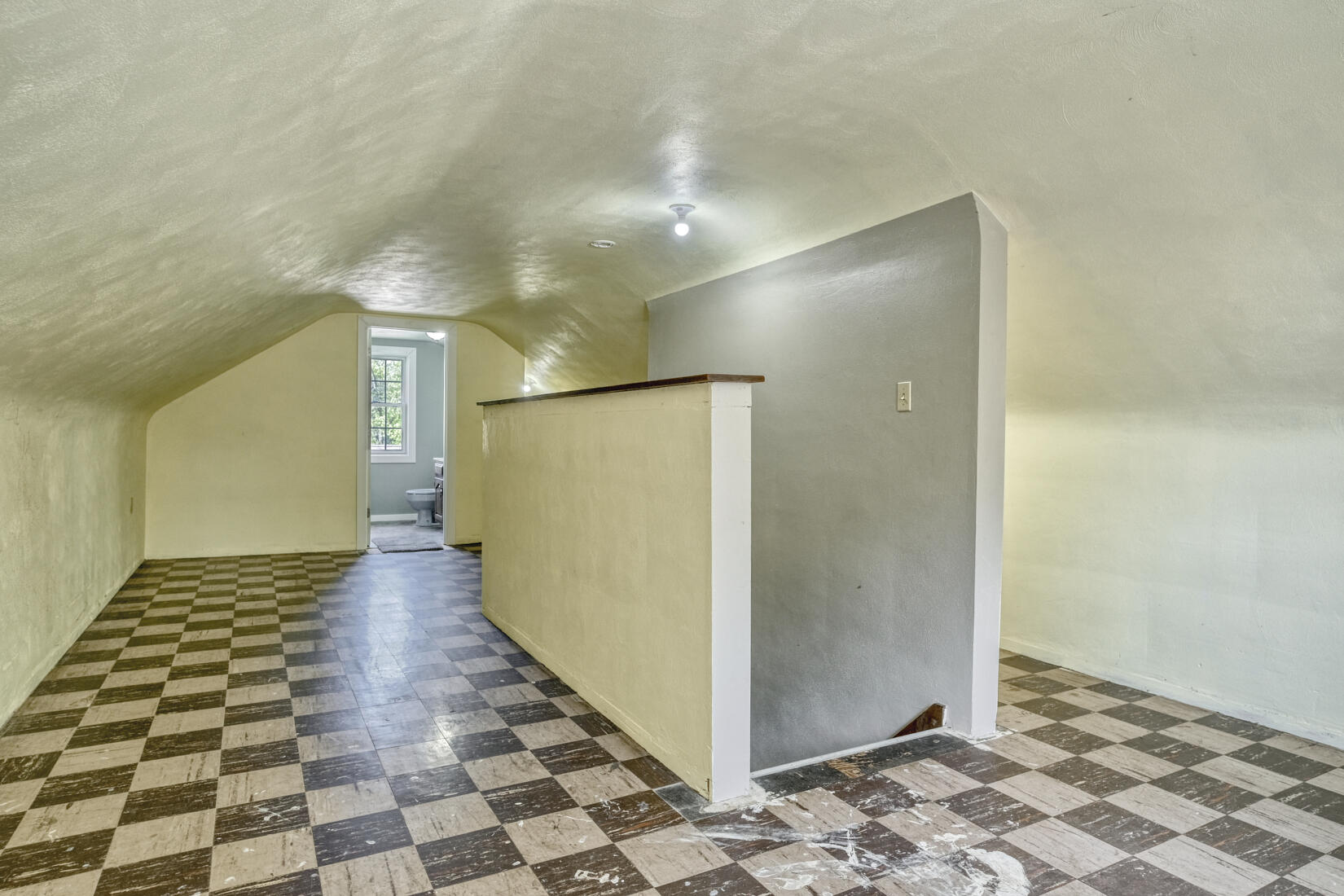 4912 West Main Street Lowell, IN 46356 - Photo 15 of 20 a view of a hallway with wooden floor