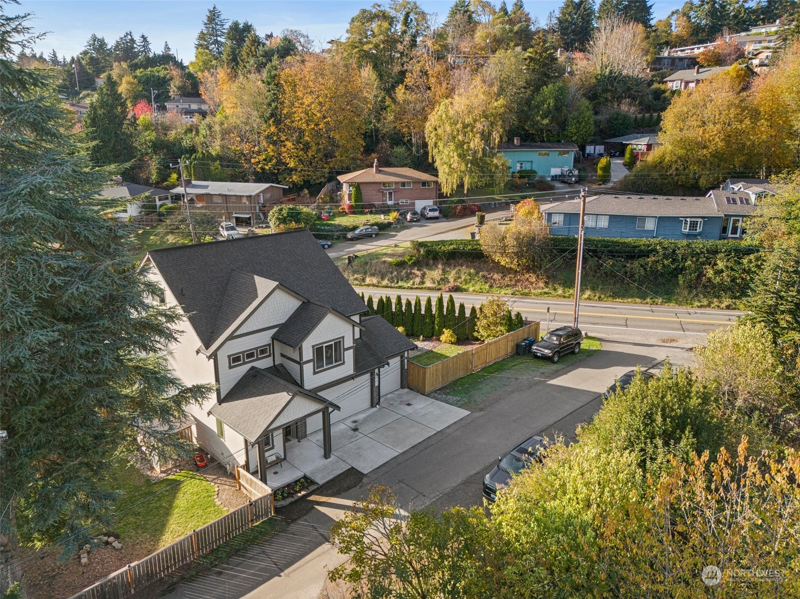 16614 Sylvester Road Southwest Burien, WA 98166 - Photo 1 of 40 an aerial view of a house with swimming pool and garden