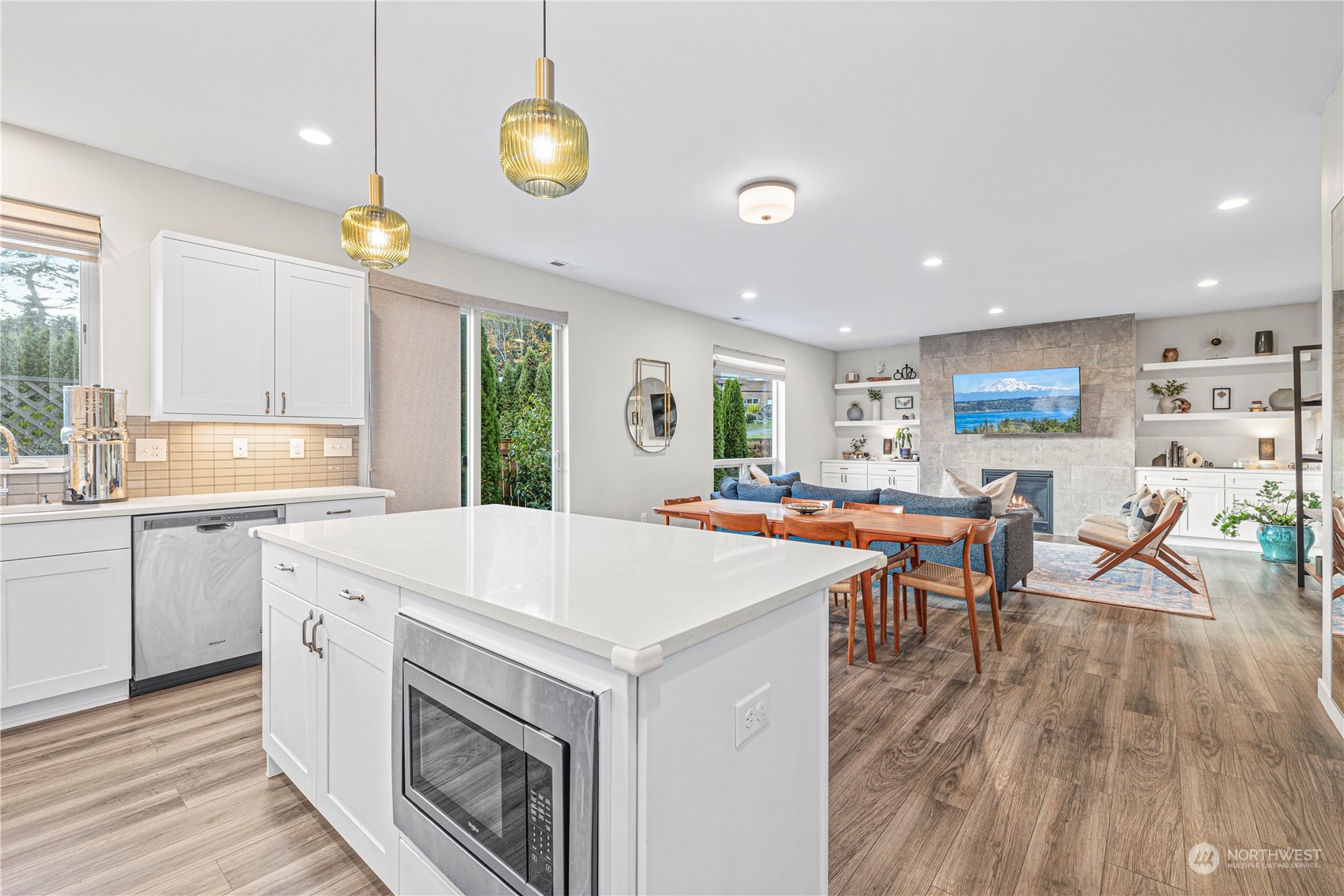 16614 Sylvester Road Southwest Burien, WA 98166 - Photo 14 of 40 a large kitchen with a table and chairs in it