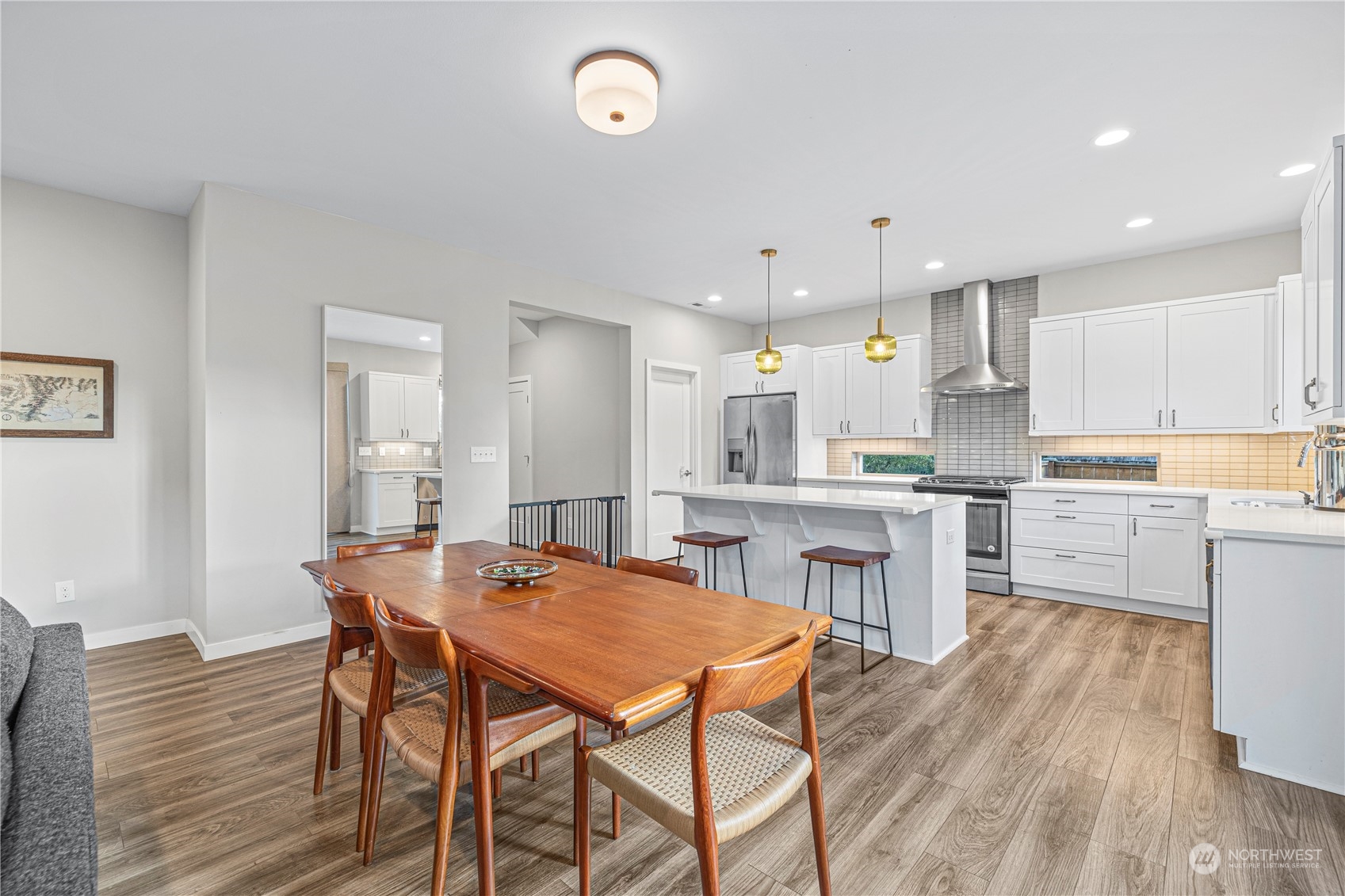 16614 Sylvester Road Southwest Burien, WA 98166 - Photo 15 of 40 a kitchen with a table and chairs in it