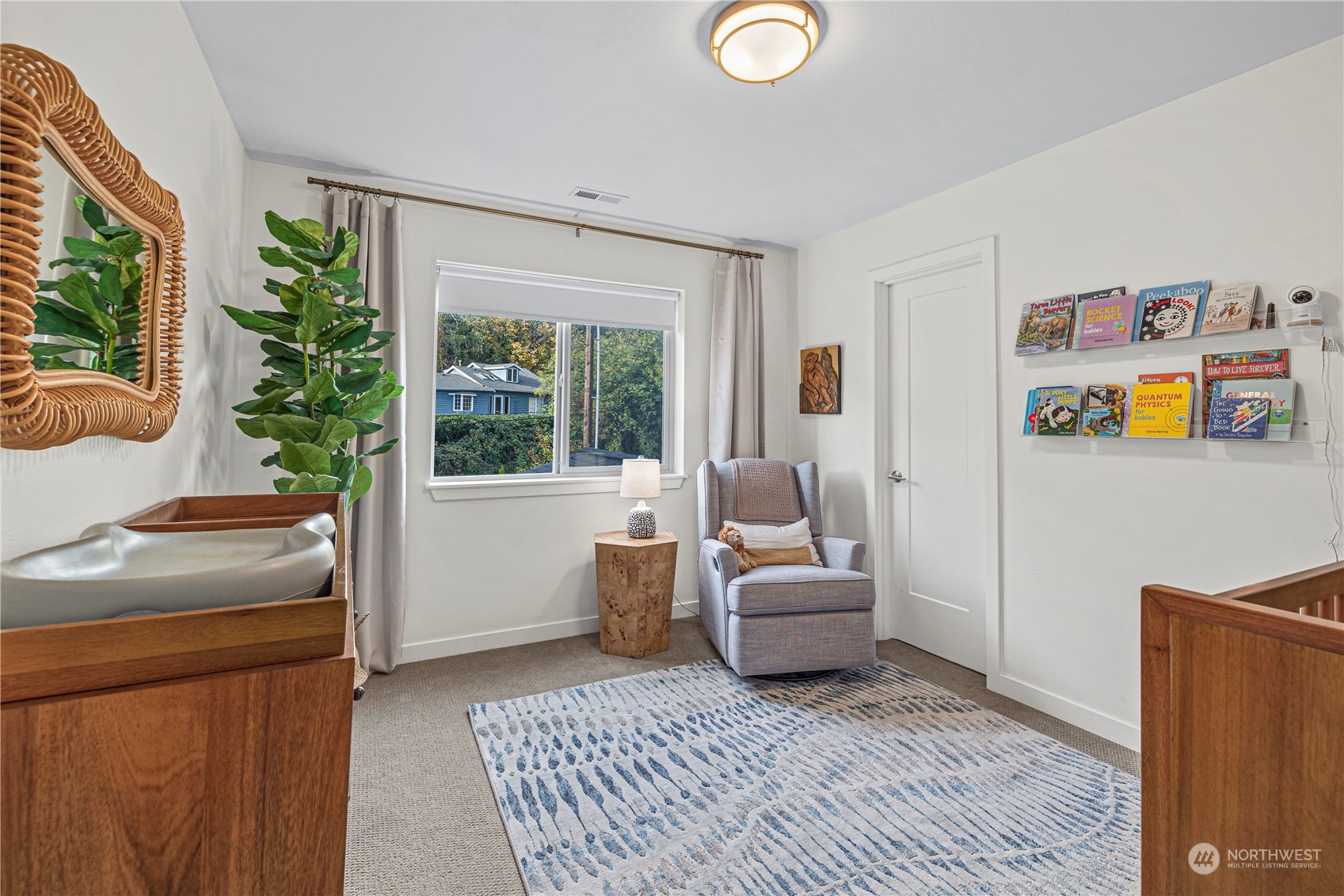 16614 Sylvester Road Southwest Burien, WA 98166 - Photo 26 of 40 a living room with furniture and a window